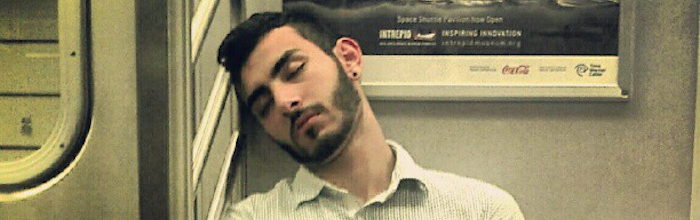 Sleep deprivation: man sleeping on train (flickr-david_shankbone)