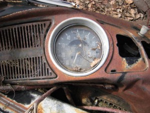 Slowing down: broken speedometer in abandoned car (by Shawn Radcliffe)