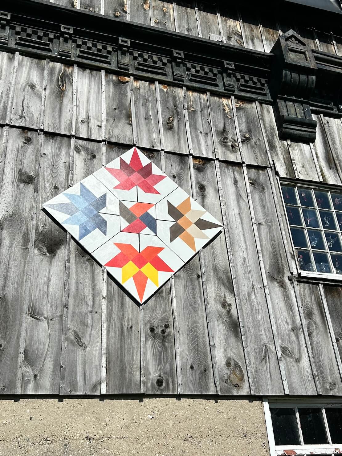 Looking at an Amish decoration on the outside of a barn can give you practice staying present