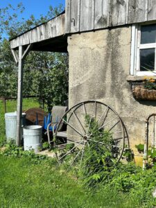 Noticing a wagon wheel and other antiques outside a barn help you with staying present